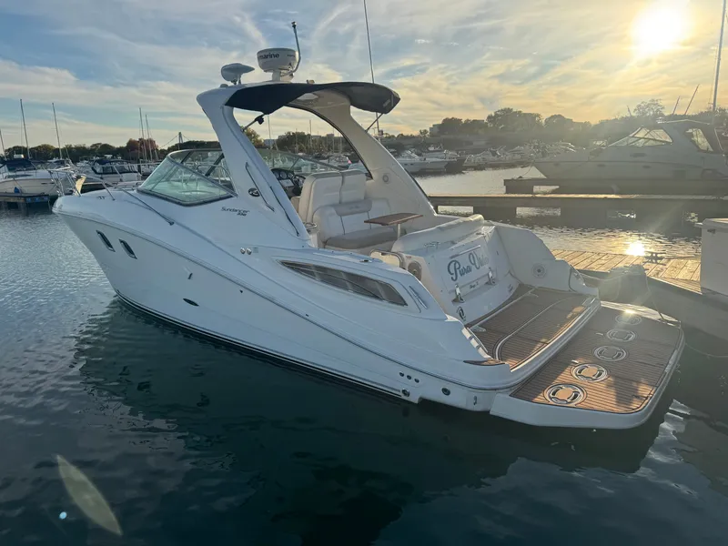 Slide: The Image of 2011 Sea Ray 330 Sundancer docked at sunset. - 5