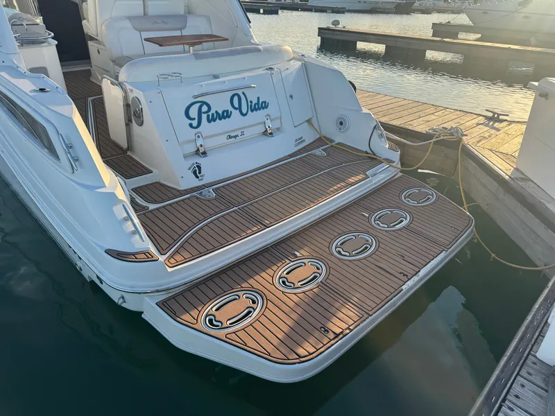 Slide: The Image of Sea Ray 330 Sundancer 2011 at dock with wooden deck. - 7