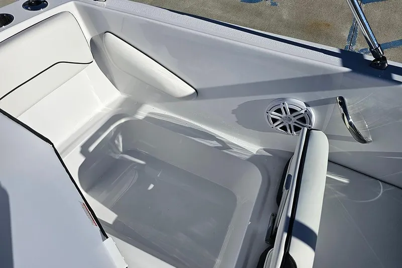 Slide: The Image of 2026 Stingray 172 DC boat interior with seating, speaker, and cup holders. - 15