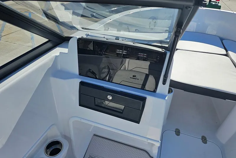 Slide: The Image of 2026 Stingray 172 DC boat interior with sleek dashboard and seating area. - 16