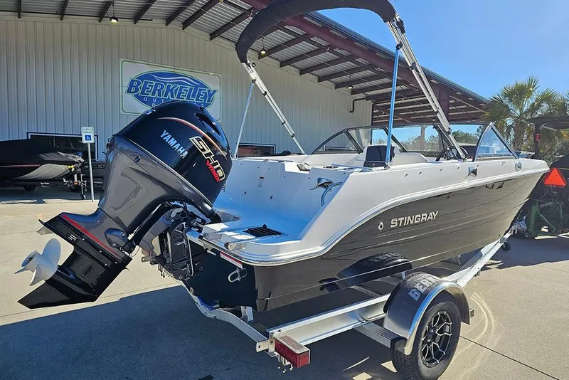 Slide: The Image of 2026 Stingray 172 DC boat with Yamaha engine on a trailer at Berkeley dealership. - 3