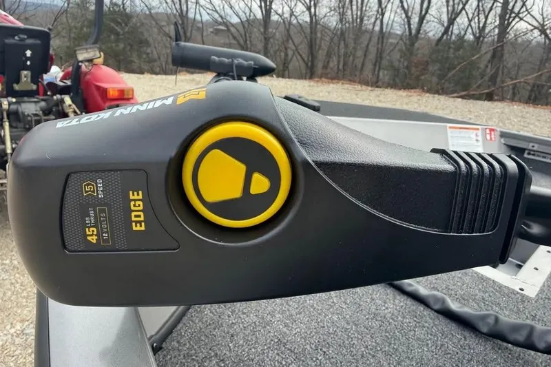 Slide: The Image of Minn Kota Edge trolling motor on 2026 Lowe Stinger 175C boat, outdoors. - 11