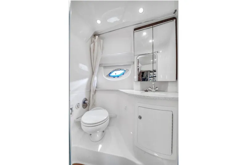 Slide: The Image of Luxurious bathroom in 2017 Regal 35 Sport Coupe yacht with modern fixtures. - 13