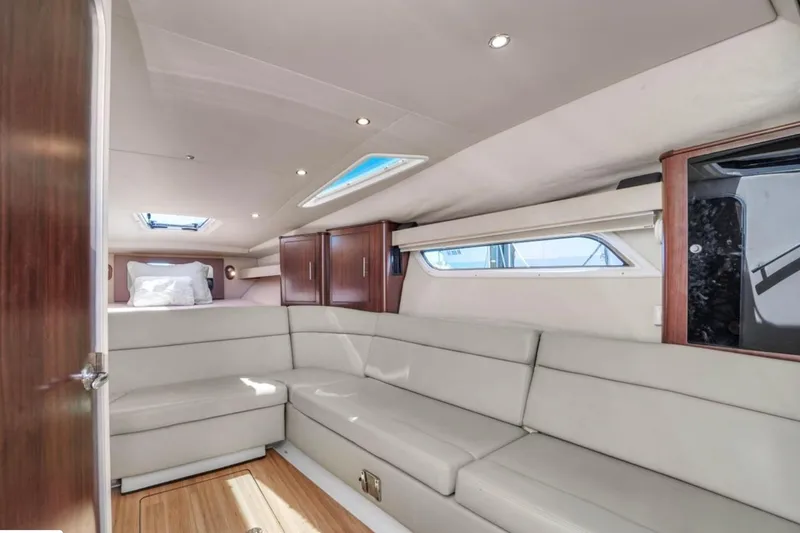 Slide: The Image of Interior of 2017 Regal 35 Sport Coupe, featuring elegant seating and modern design. - 7