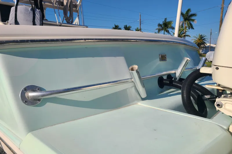 Slide: The Image of 2002 Scout 280 Sportfish boat deck with rod holders and equipment. - 20