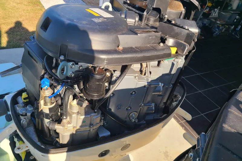 Slide: The Image of Outboard motor of a 2002 Scout 280 Sportfish boat, detailed view. - 23