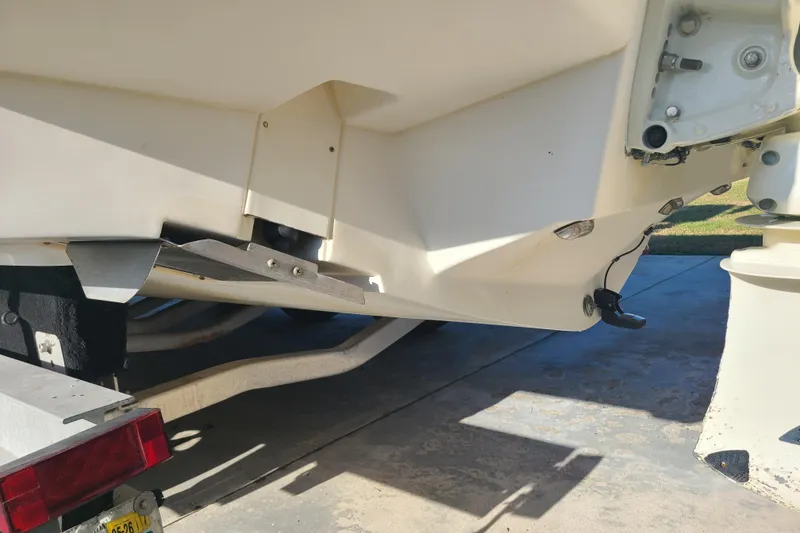 Slide: The Image of Rear view of a 2002 Scout 280 Sportfish boat on a trailer. - 26