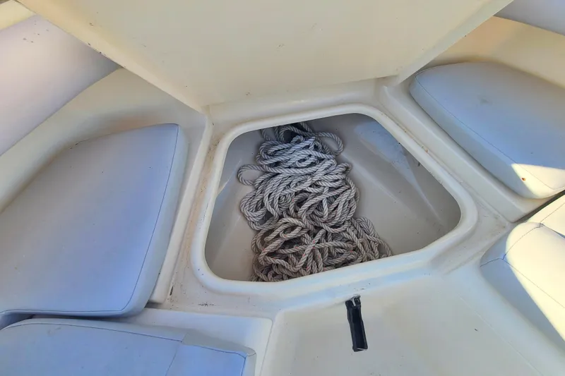 Slide: The Image of Storage compartment with rope on a 2002 Scout 280 Sportfish boat. - 7
