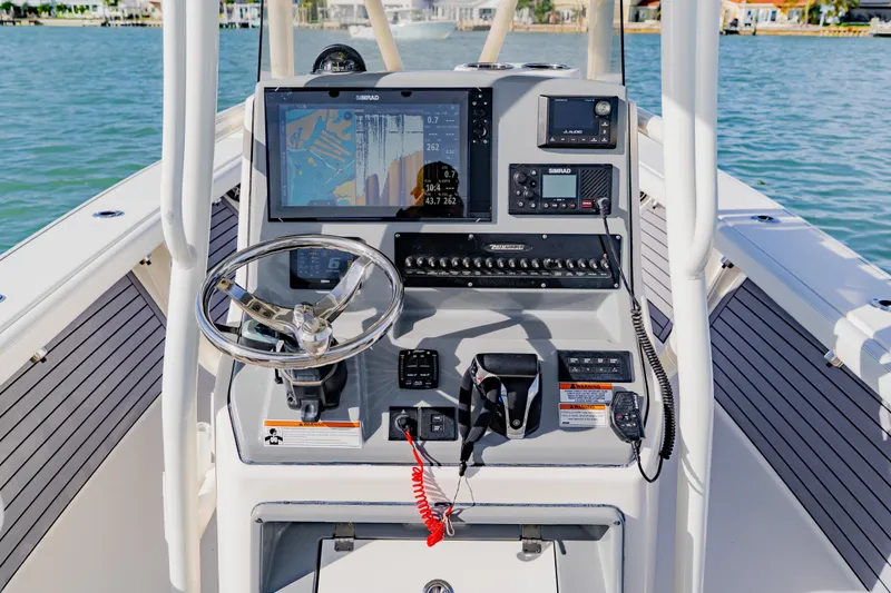 Slide: The Image of 2023 Pathfinder 2700 Open boat console with navigation and control systems. - 21