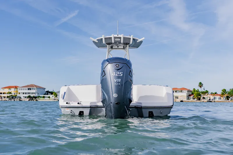 Slide: The Image of 2023 Pathfinder 2700 Open boat with powerful outboard engine on calm water. - 7