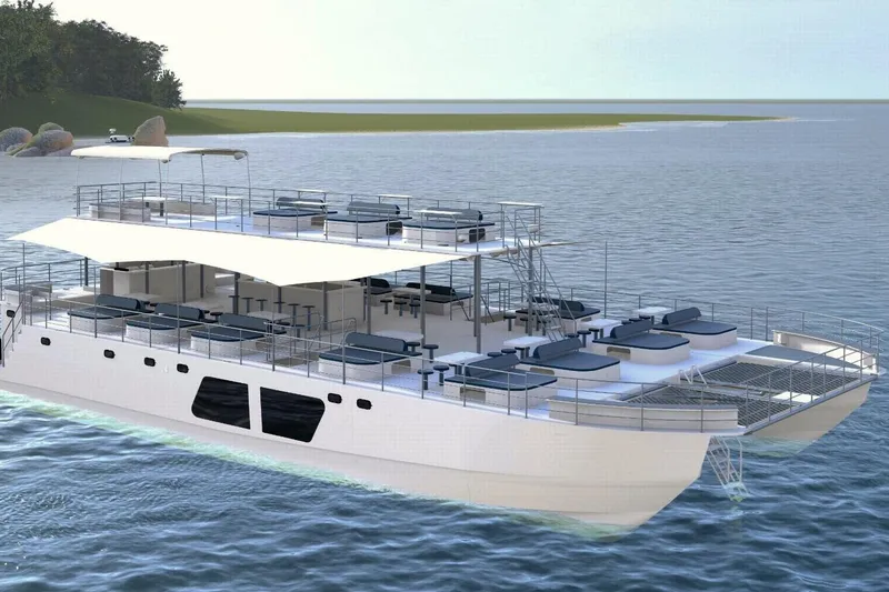 Slide: The Image of Modern 2027 Custom PAXCAT catamaran on serene water, featuring spacious decks and sleek design. - 2