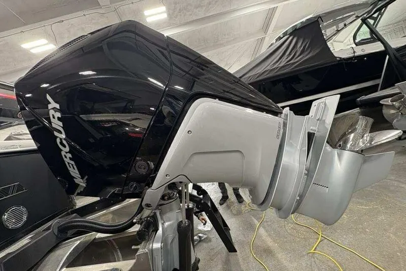 Slide: The Image of Mercury outboard motor on 2026 Avalon 2585 CAT QL boat in showroom. - 21