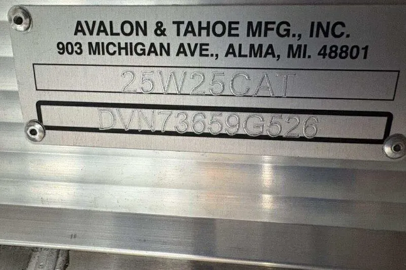 Slide: The Image of Metal plate with Avalon & Tahoe MFG details and serial number, model 2585 CAT QL, year 2026. - 22
