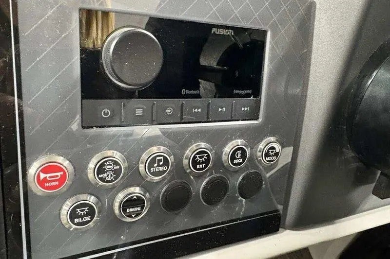 Slide: The Image of Control panel of 2026 Avalon 2585 CAT QL with buttons and display. - 23