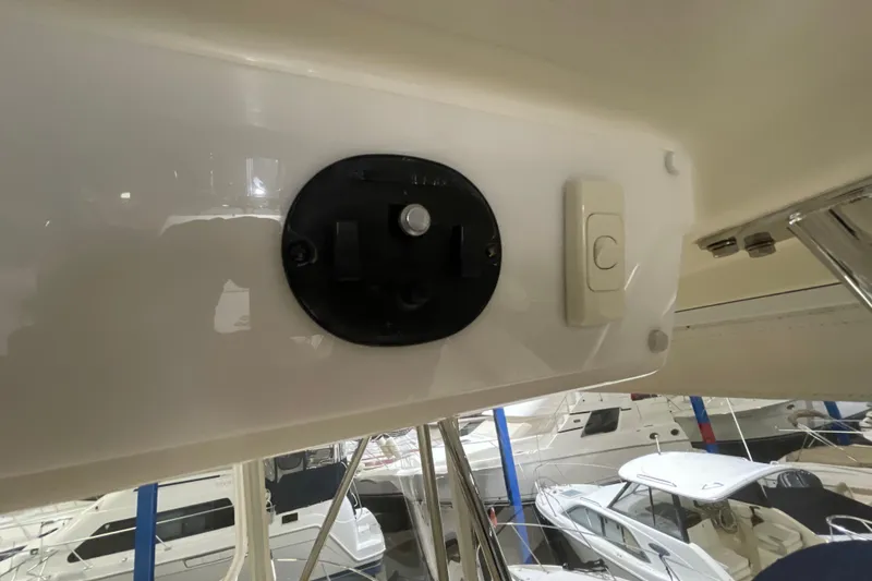 Slide: The Image of Close-up of a 2002 Riviera 34 Convertible boat control panel display. - 29