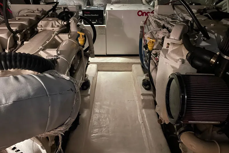 Slide: The Image of Engine room of 2002 Riviera 34 Convertible with Onan Marine GenSet. - 43