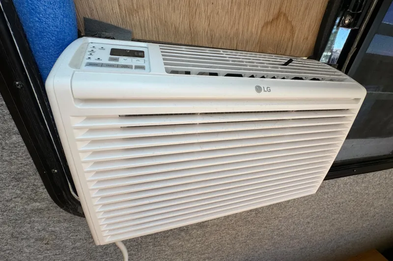 Slide: The Image of LG air conditioner installed on a 1999 Gibson Houseboat 50 interior wall. - 34