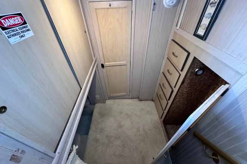 Slide: The Image of forward head, to the left is the twin berthing area , right is storage closet and built in drawers - 68