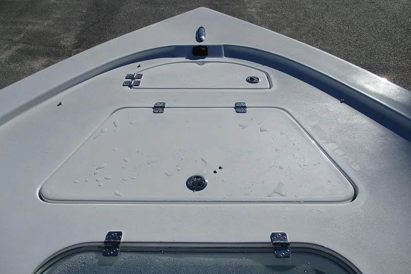 Slide: The Image of Bow deck of 2026 Sea Pro 250 Bay boat with storage compartments. - 14