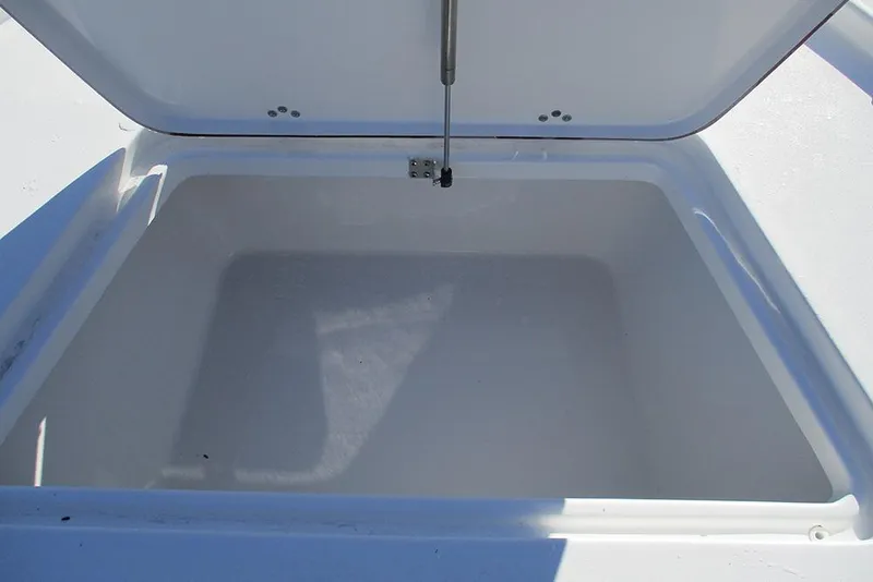 Slide: The Image of Open storage compartment on 2026 Sea Pro 250 Bay boat. - 16