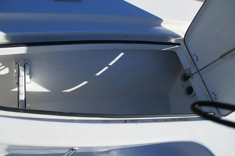 Slide: The Image of Open storage compartment on 2026 Sea Pro 250 Bay boat, showcasing interior space. - 25