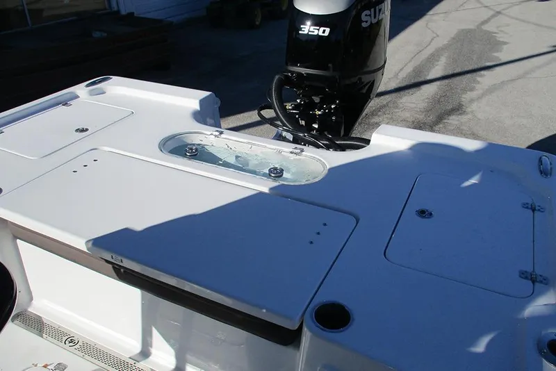 Slide: The Image of 2026 Sea Pro 250 Bay boat with Suzuki 350 engine, featuring a spacious deck layout. - 26