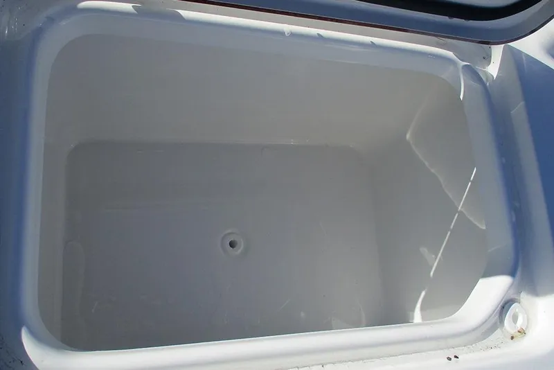 Slide: The Image of Open storage compartment on 2026 Sea Pro 250 Bay boat. - 34