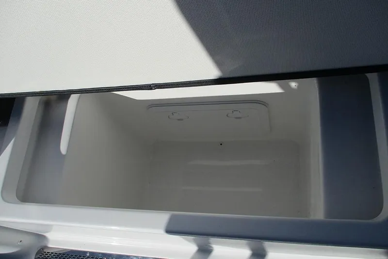 Slide: The Image of Open storage compartment on 2026 Sea Pro 250 Bay boat. - 41