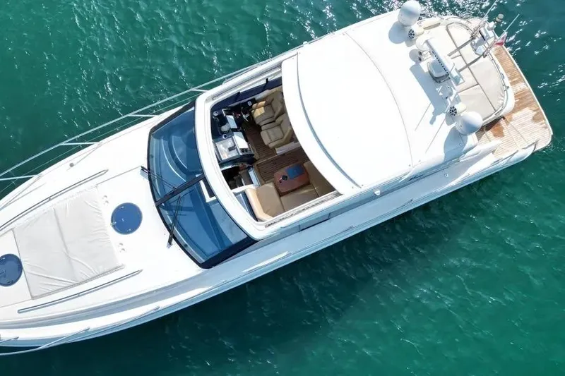 Slide: The Image of Aerial view of 2008 Princess V53 yacht on clear blue water. - 14