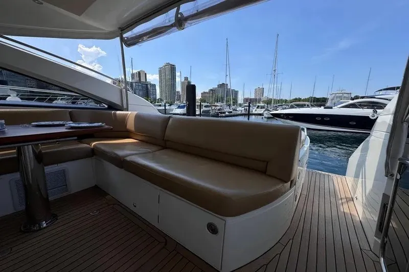 Slide: The Image of Luxurious 2008 Princess V53 yacht interior with marina view and city skyline. - 22