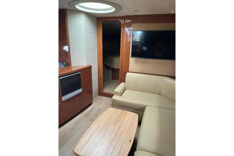 Slide: The Image of Luxurious interior of 2008 Princess V53 yacht with beige seating and modern amenities. - 29