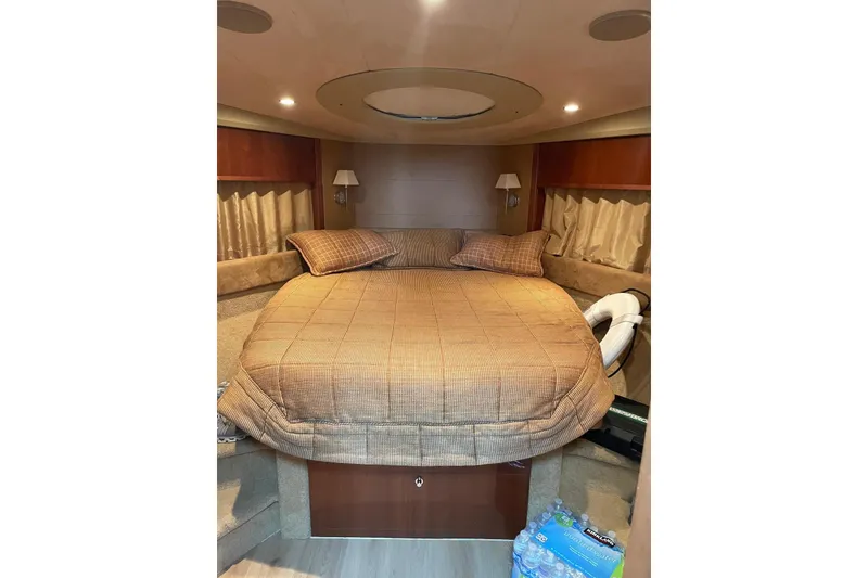 Slide: The Image of Luxurious cabin interior of 2008 Princess V53 yacht with cozy bed and elegant decor. - 31