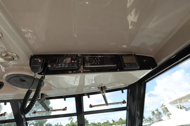 Slide: The Image of Interior view of 2011 Everglades 320EX boat with communication equipment. - 15