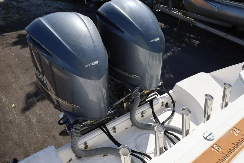 Slide: The Image of Twin Yamaha V8 outboard engines on a 2011 Everglades 320EX boat. - 31