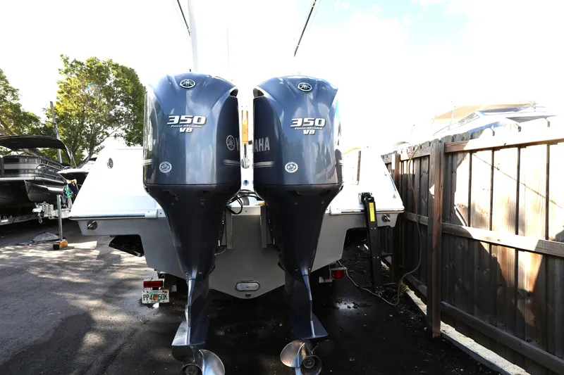 Slide: The Image of 2011 Everglades 320EX boat with twin Yamaha 350 V8 outboard engines. - 5