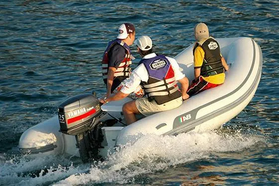 Slide: The Image of Manufacturer Provided Image: Three people riding AB Inflatables Ventus 12 VL inflatable boat, 2025 model. - 2