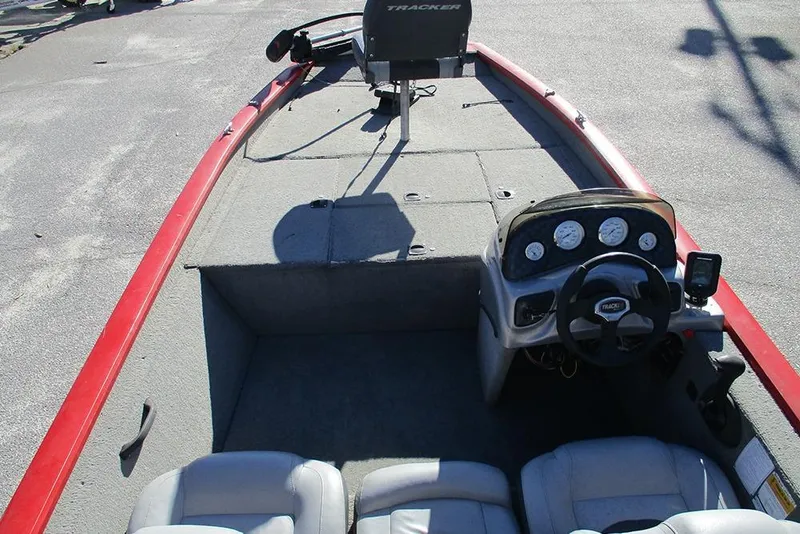 Slide: The Image of 2007 Tracker Pro Team 190 TX boat interior with steering console and seating. - 7