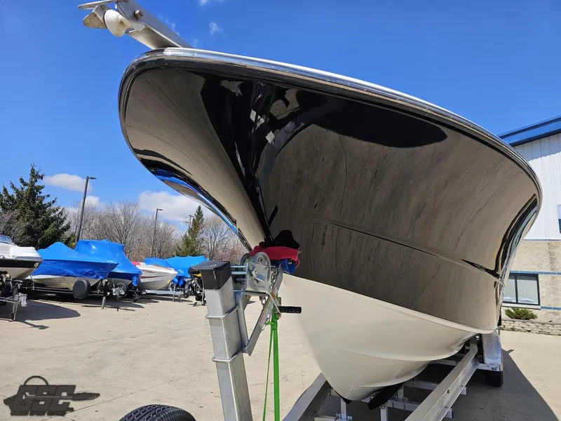 Slide: The Image of 2007 Triton 351 CC boat on a trailer, ready for transport. - 19