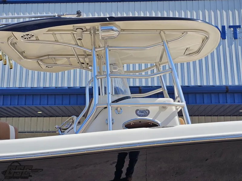 Slide: The Image of 2007 Triton 351 CC boat with T-top and center console. - 4