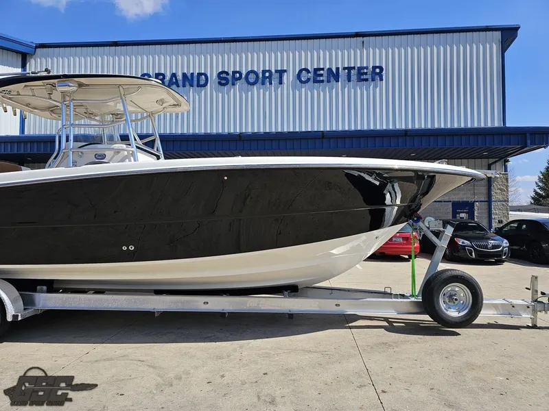 Slide: The Image of 2007 Triton 351 CC boat on trailer at Grand Sport Center. - 7