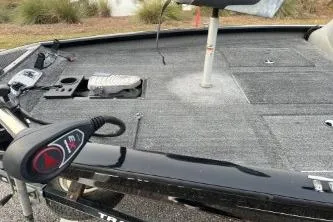 Slide: The Image of 2015 Tracker Pro Team 175 TXW boat deck with fishing equipment. - 4