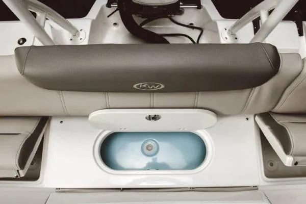 Slide: The Image of 2026 Key West 219 FS boat interior with seating and storage compartment. - 3