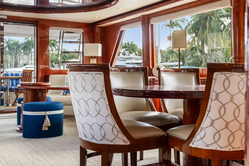 Slide: The Image of Luxurious interior of 2005 Ocean Alexander 80 Motoryacht with elegant dining area and plush seating. - 17