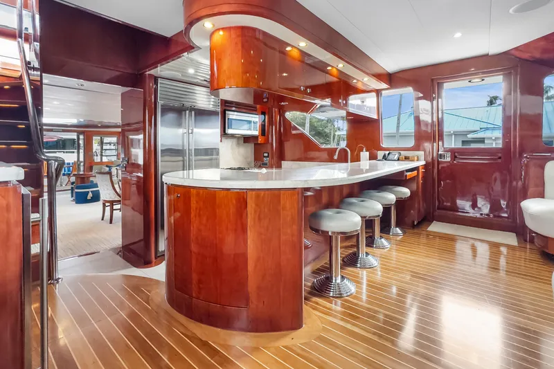 Slide: The Image of Luxurious interior of 2005 Ocean Alexander 80 Motoryacht with elegant wood finishes and modern amenities. - 2