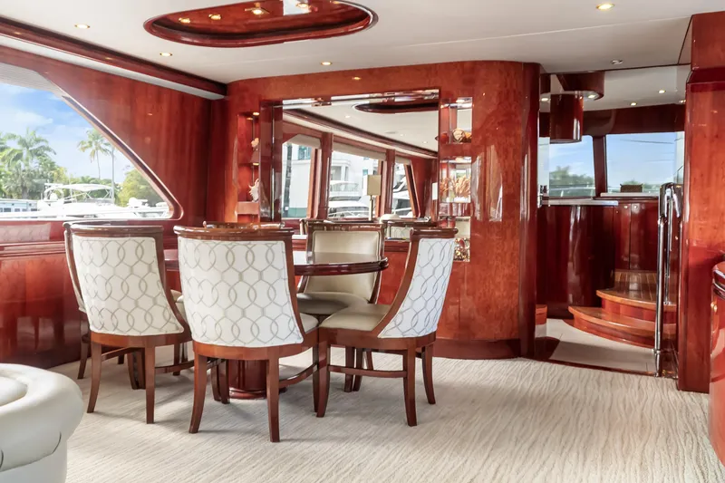 Slide: The Image of Luxurious interior of 2005 Ocean Alexander 80 Motoryacht with elegant dining area and wooden finishes. - 20