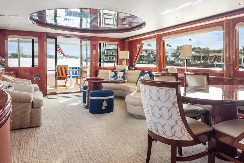 Slide: The Image of Luxurious interior of 2005 Ocean Alexander 80 Motoryacht with elegant seating and dining area. - 21