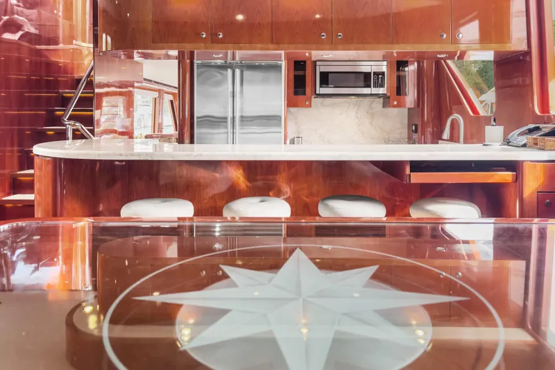 Slide: The Image of Luxurious kitchen interior of 2005 Ocean Alexander 80 Motoryacht with modern appliances and seating. - 28