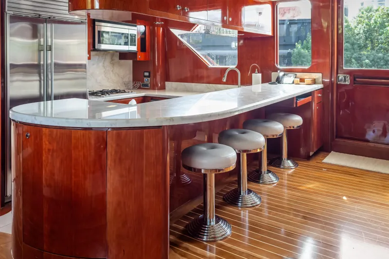 Slide: The Image of Luxurious kitchen interior of 2005 Ocean Alexander 80 Motoryacht with sleek wood finishes. - 30