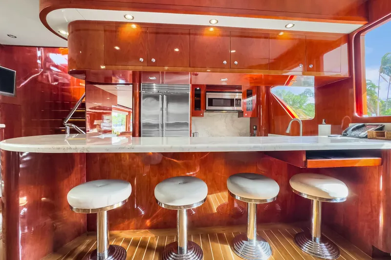 Slide: The Image of Luxurious kitchen interior of 2005 Ocean Alexander 80 Motoryacht with sleek wood finishes and modern appliances. - 33