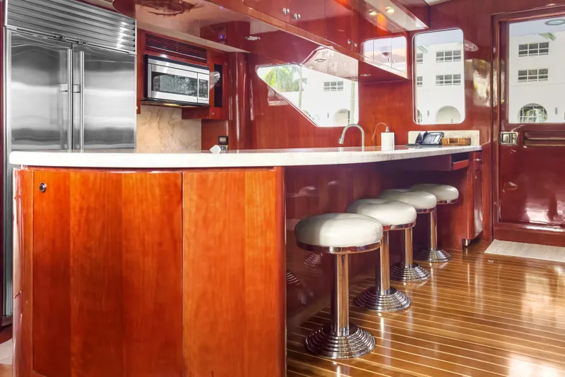 Slide: The Image of Luxurious kitchen interior of 2005 Ocean Alexander 80 Motoryacht with sleek wood finishes. - 35